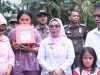 Wabup Kampar Salurkan Bantuan kepada Keluarga Korban Kebakaran di Desa Pangkalan Baru